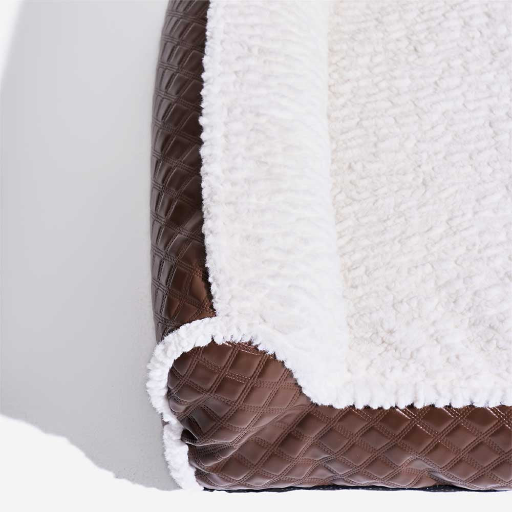 Cama de perros de almohada acogedora de acogedor