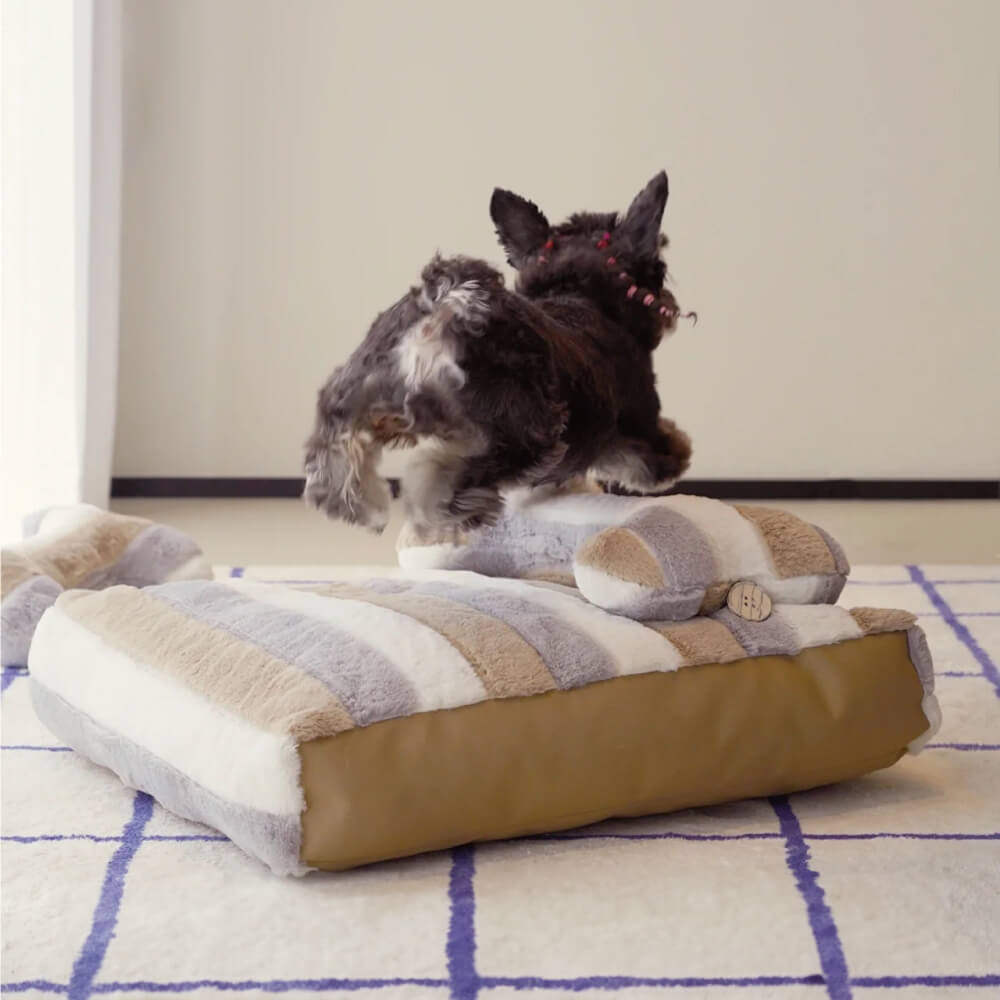 Cama relajante de felpa a rayas de lujo para perros con almohada