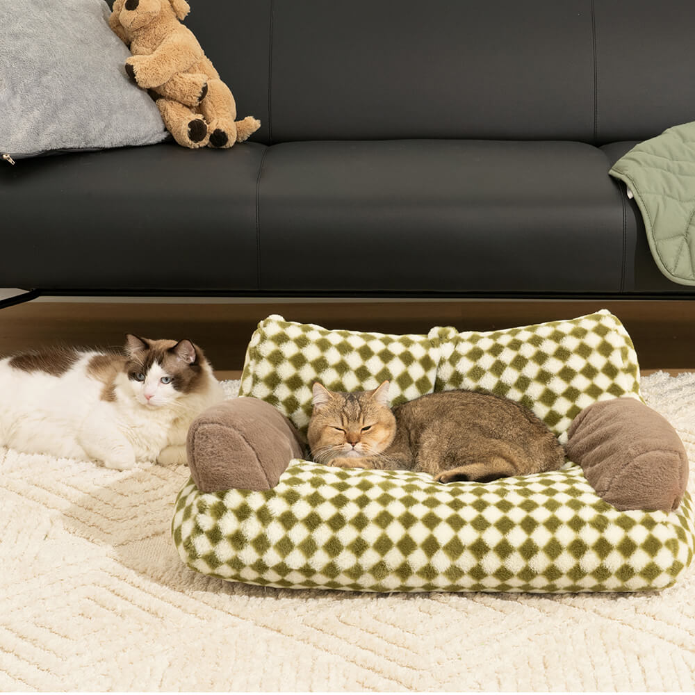 Sofá cama vintage con diseño de gato y diamantes